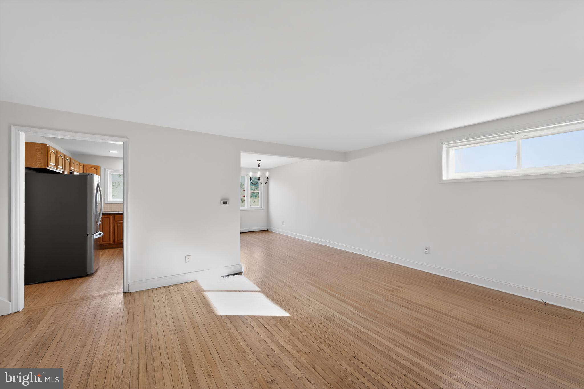 1567 Sugartown Road Paoli, PA 19301 - Photo 6 of 32 wooden floor in an empty room