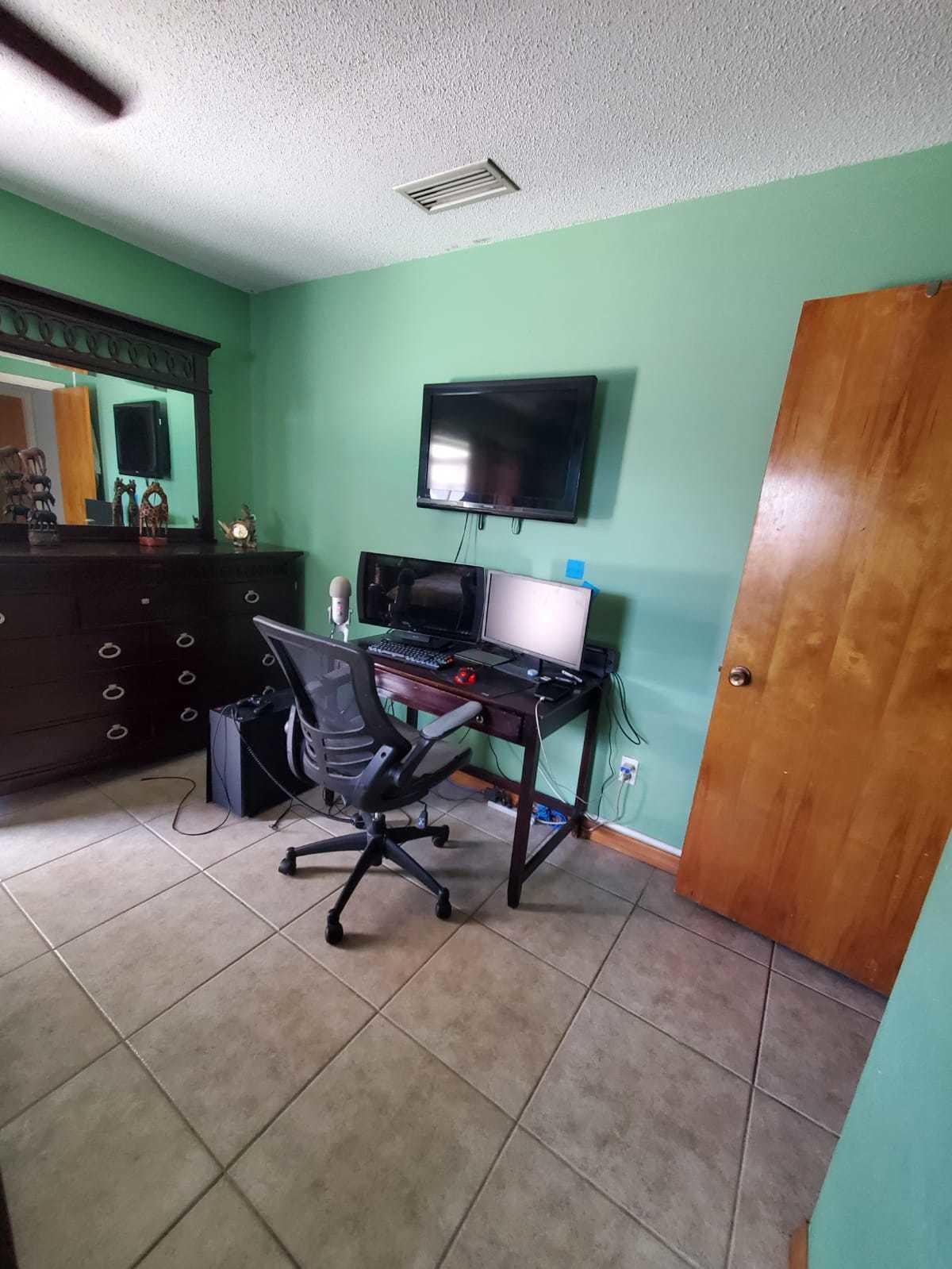 437 Kirk Road Palm Springs, FL 33461 - Photo 24 of 53 a view of a workspace with furniture