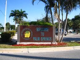 437 Kirk Road Palm Springs, FL 33461 - Photo 53 of 53 a sign that is on the side of a building