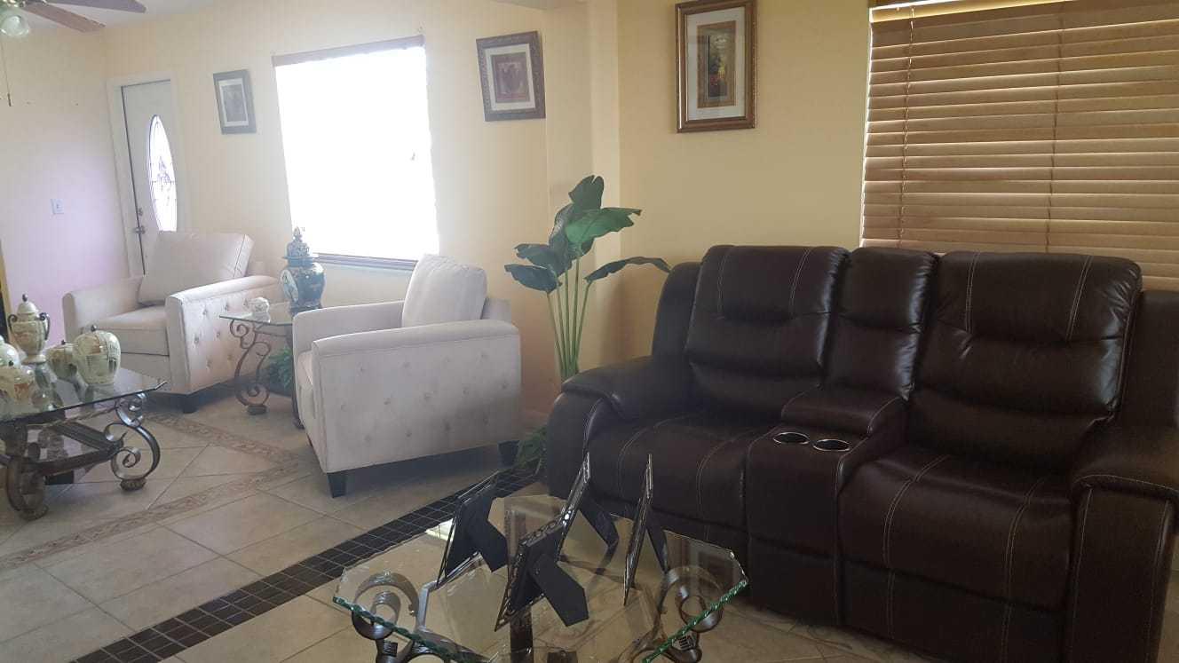 437 Kirk Road Palm Springs, FL 33461 - Photo 7 of 53 a living room with furniture