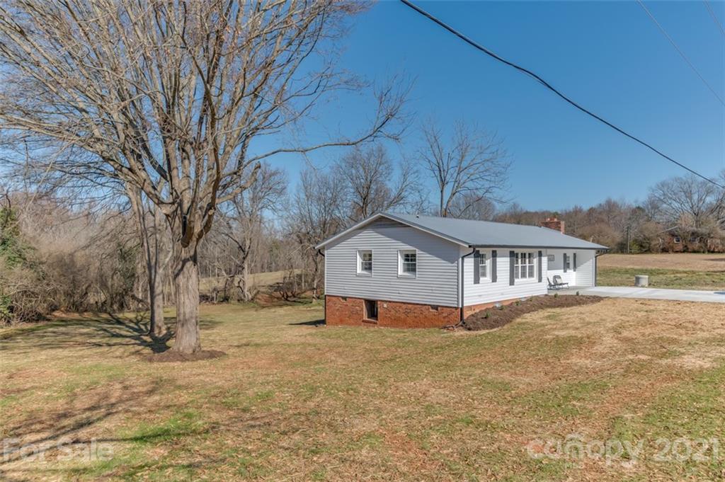 310 Webb Church Road Ellenboro, NC 28040 - Photo 11 of 35 a front view of a house with a yard