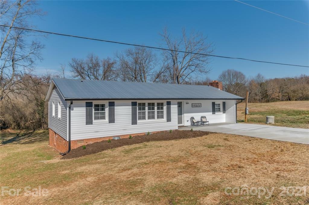 310 Webb Church Road Ellenboro, NC 28040 - Photo 13 of 35 front view of a house with a yard