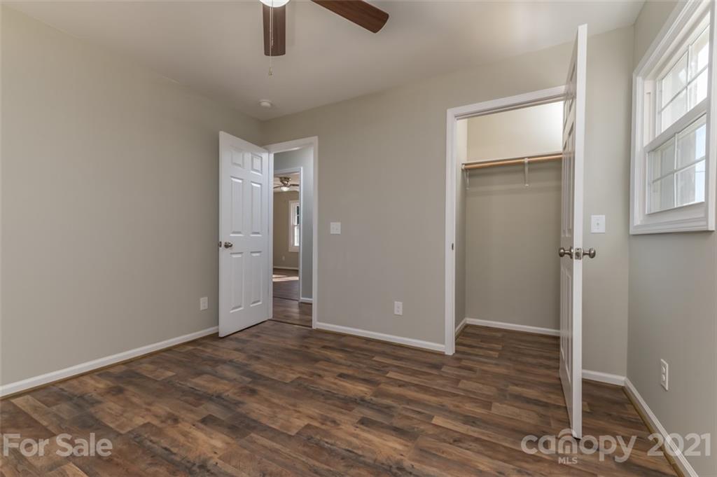 310 Webb Church Road Ellenboro, NC 28040 - Photo 27 of 35 an empty room with closet and windows