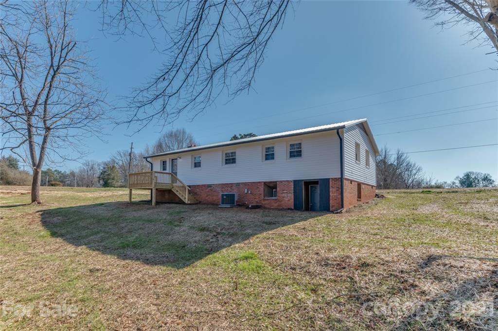 310 Webb Church Road Ellenboro, NC 28040 - Photo 30 of 35 a view of a house with backyard and tree