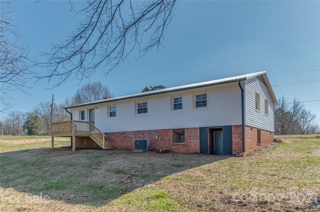 310 Webb Church Road Ellenboro, NC 28040 - Photo 31 of 35 a view of a house with backyard
