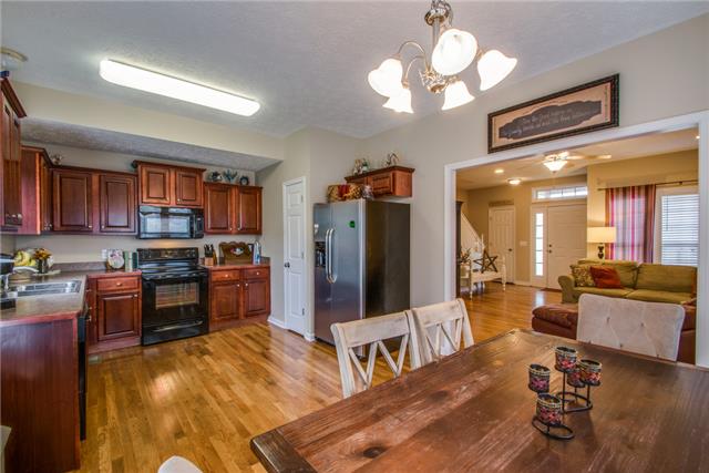 515 Berry Circle Springfield, TN 37172 - Photo 5 of 18 a large kitchen with cabinets