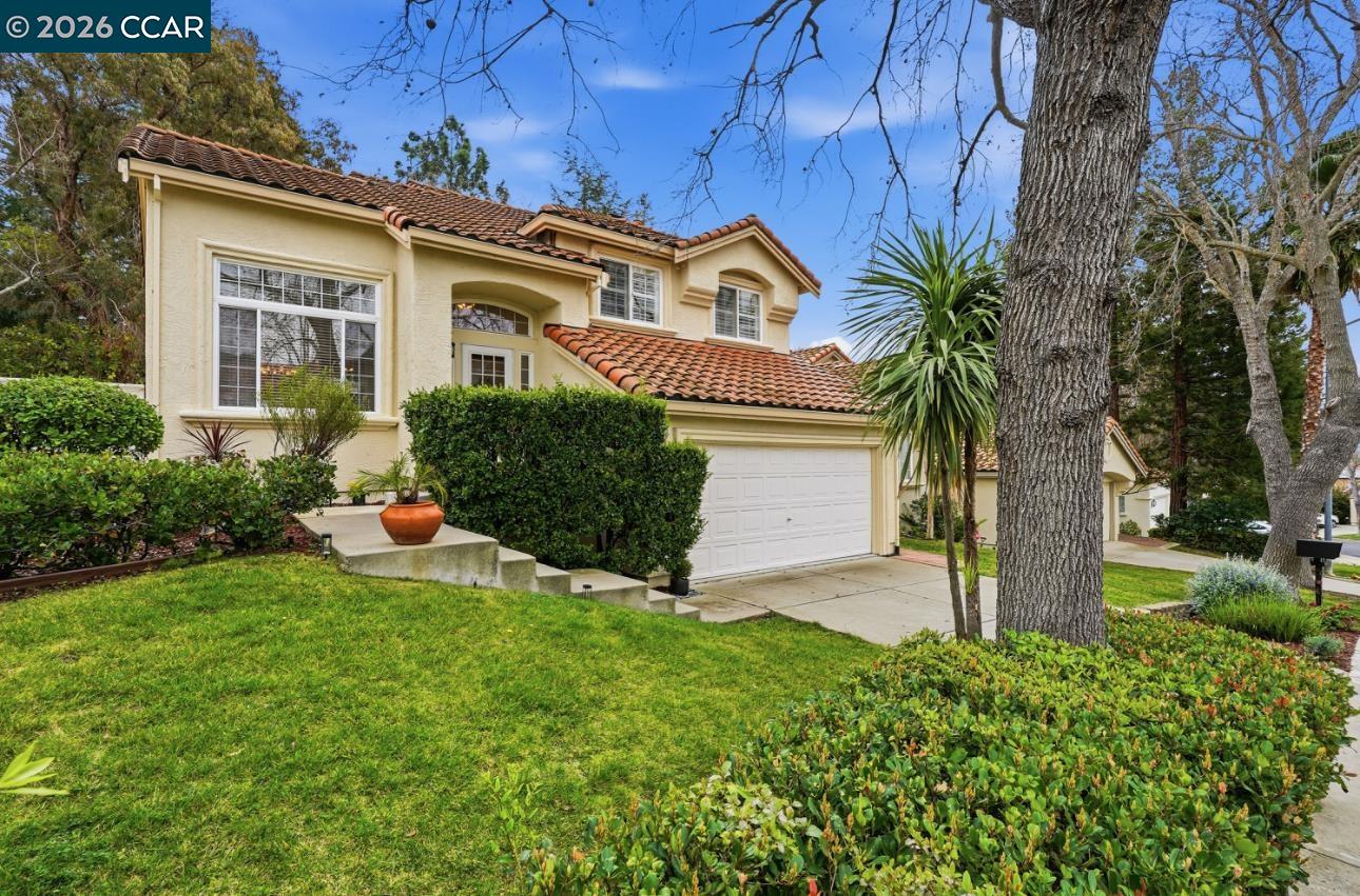 2175 Bluerock Circle Concord, CA 94521 - Photo 1 of 48 a front view of a house with garden
