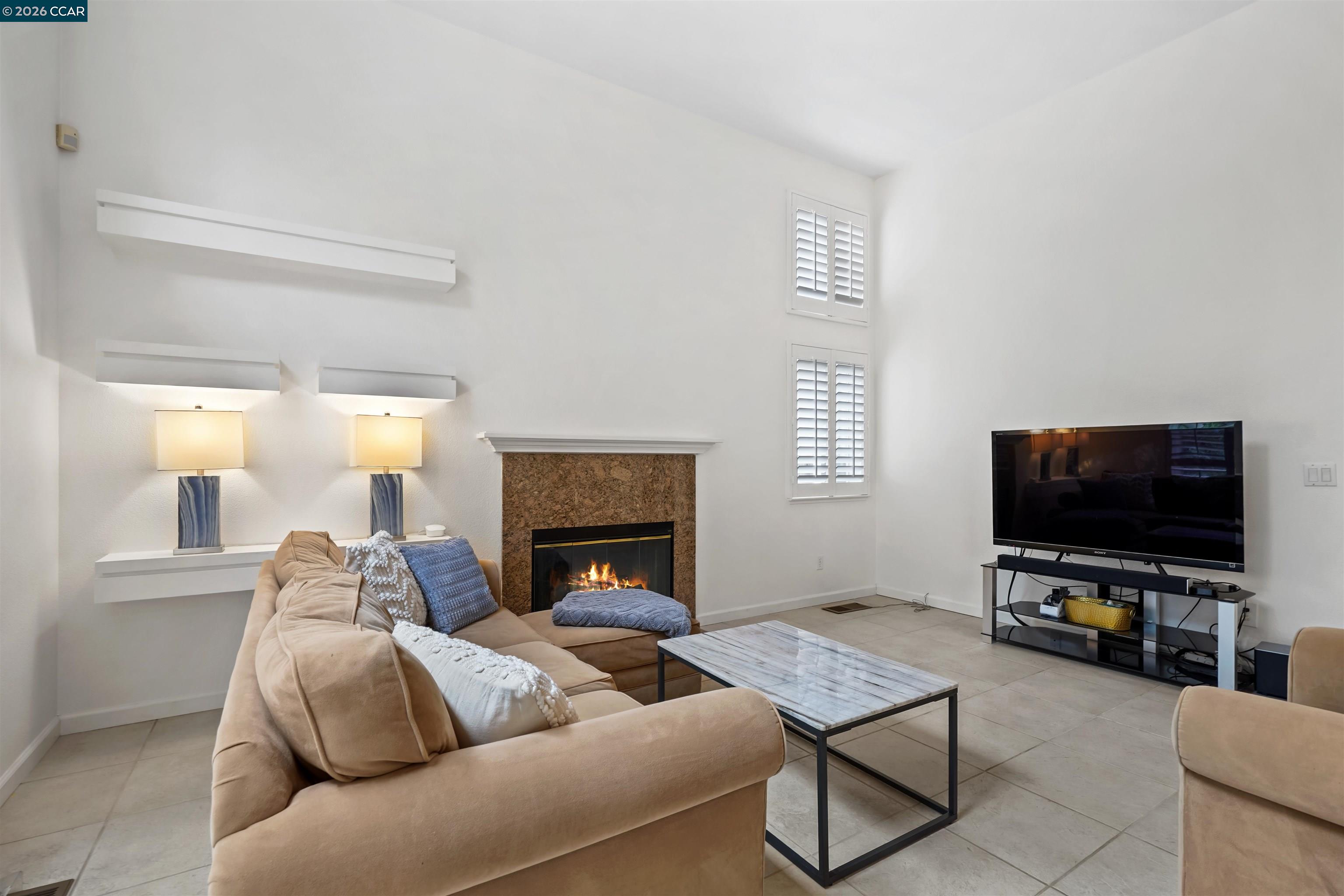 2175 Bluerock Circle Concord, CA 94521 - Photo 18 of 48 a living room with furniture and a flat screen tv