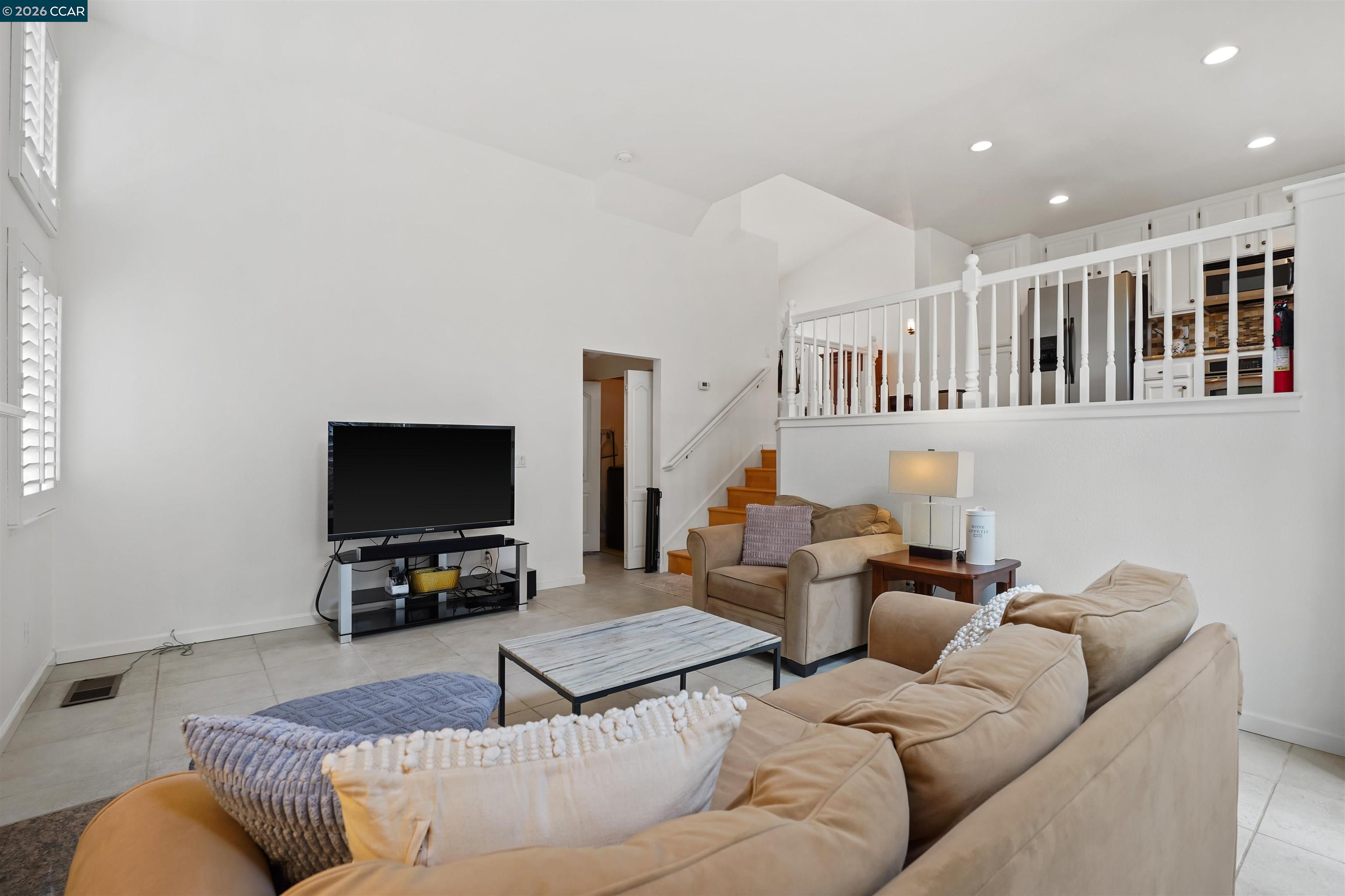 2175 Bluerock Circle Concord, CA 94521 - Photo 19 of 48 a living room with furniture and a flat screen tv