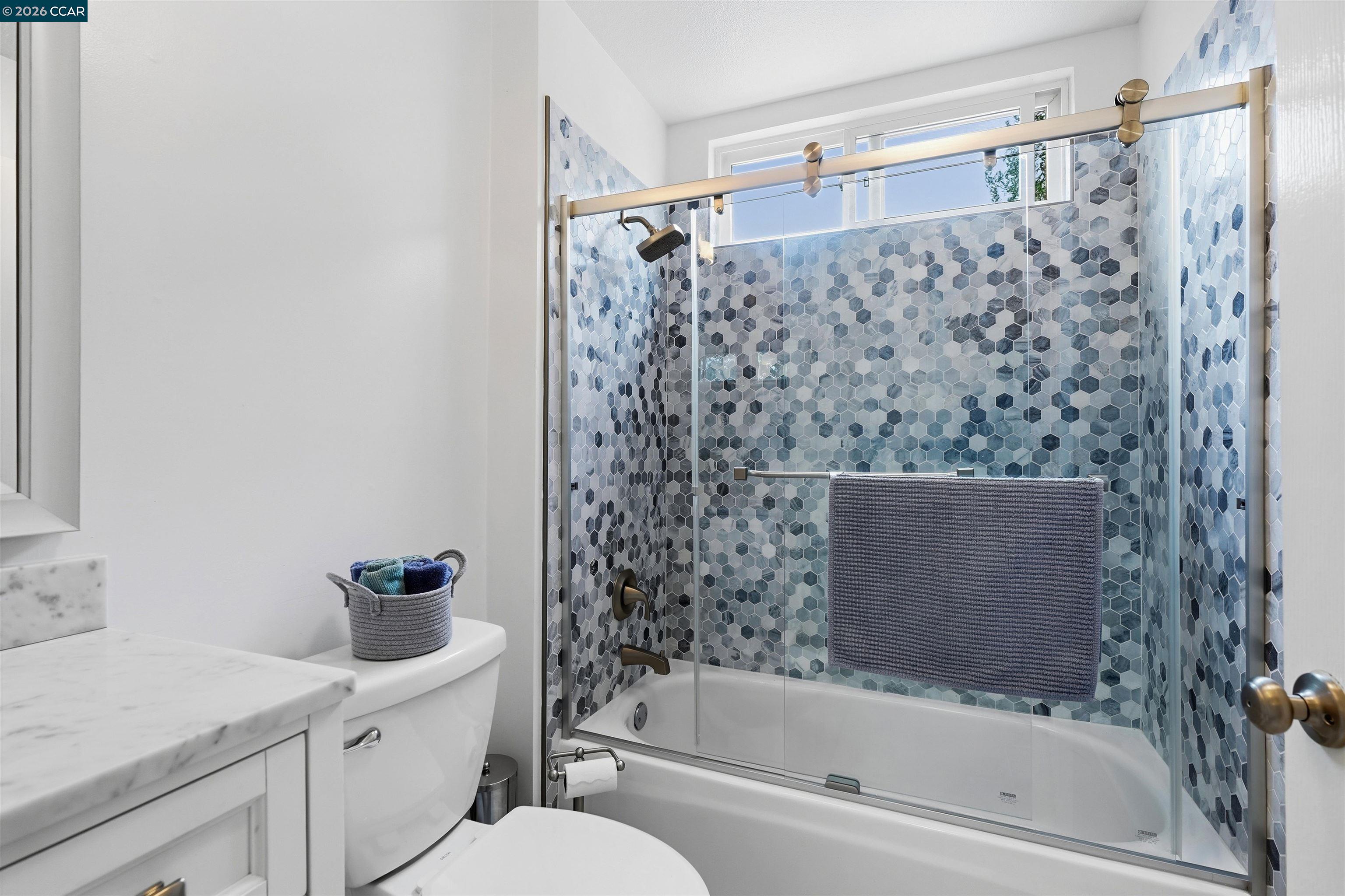 2175 Bluerock Circle Concord, CA 94521 - Photo 32 of 48 a bathroom with a shower curtain and a sink