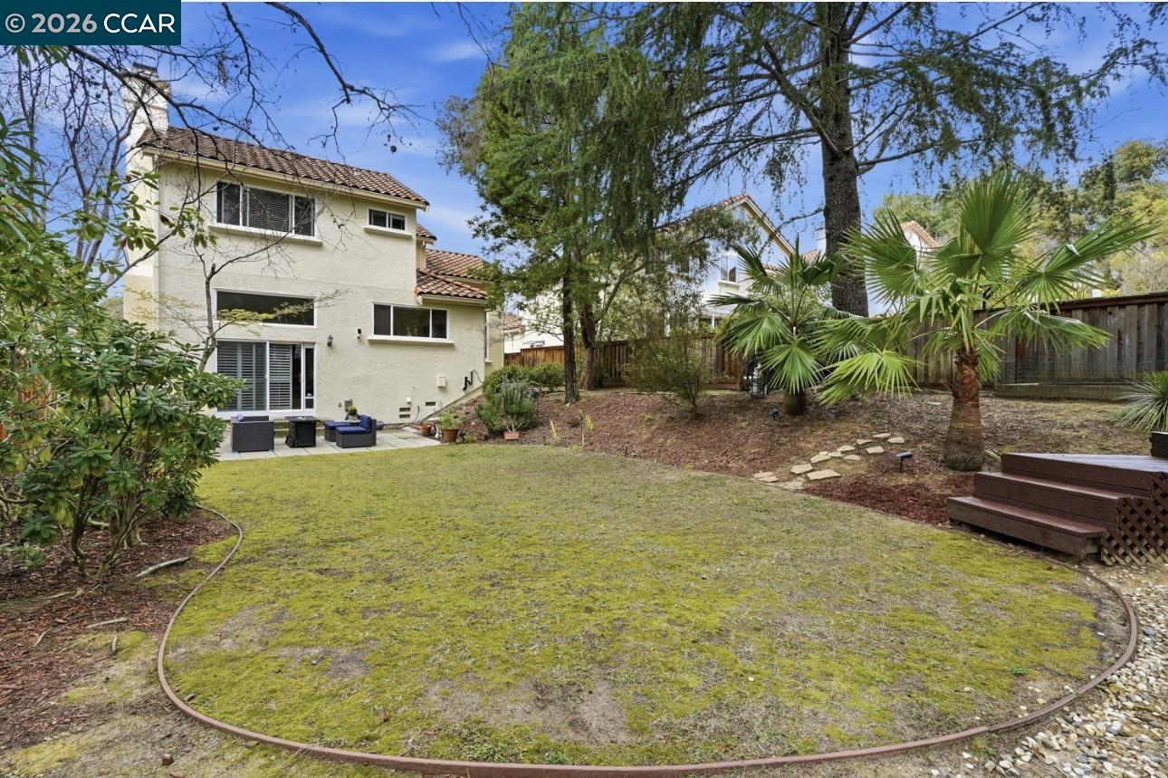 2175 Bluerock Circle Concord, CA 94521 - Photo 41 of 48 a backyard of a house with yard and outdoor seating