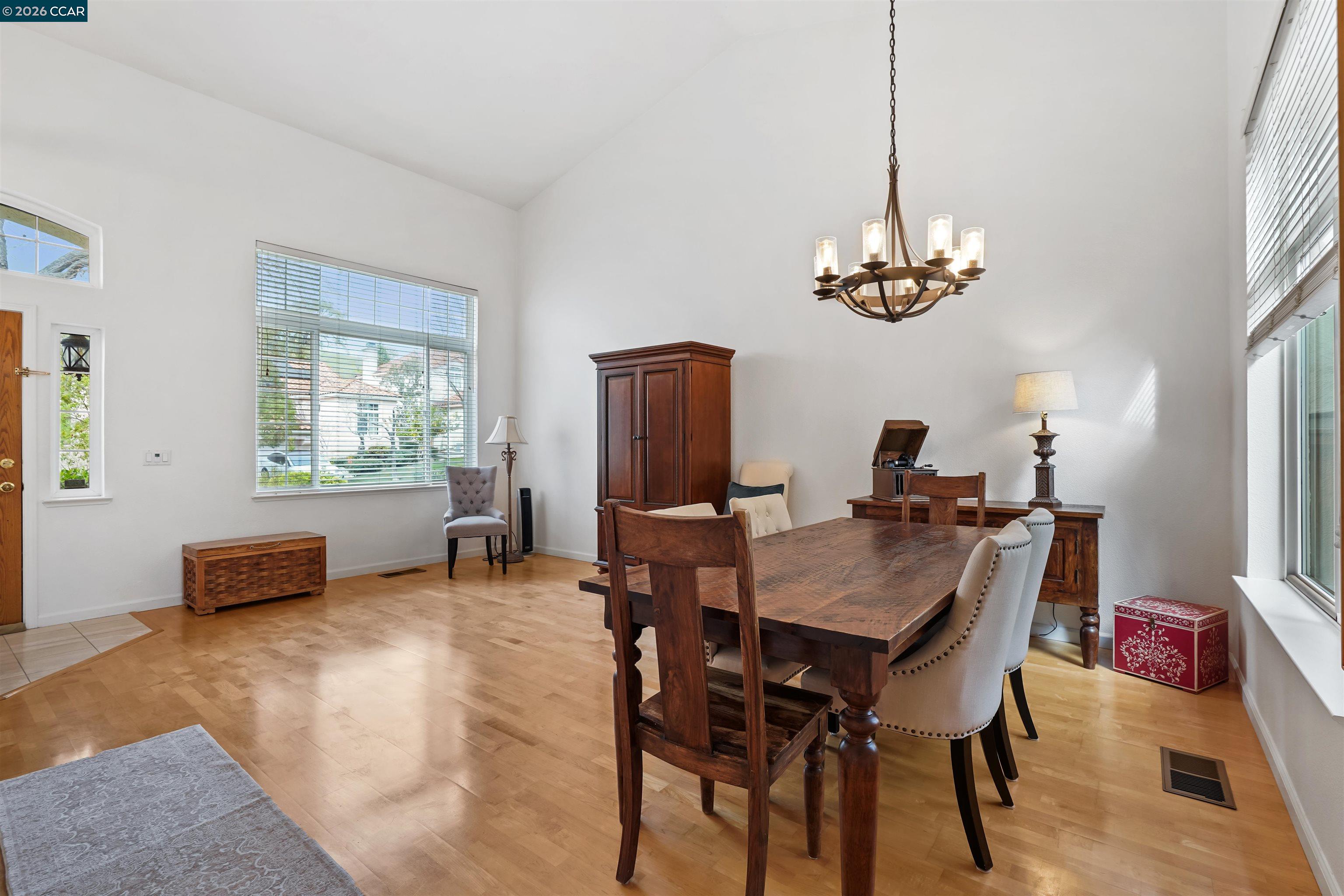 2175 Bluerock Circle Concord, CA 94521 - Photo 9 of 48 a view of a dining room with furniture window and wooden floor