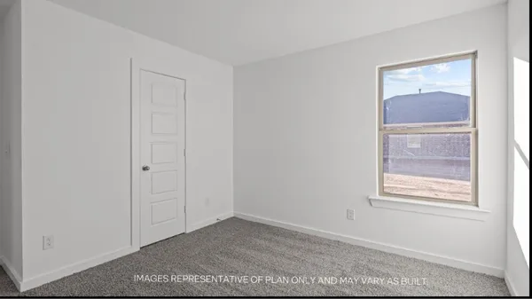 a view of an empty room with window