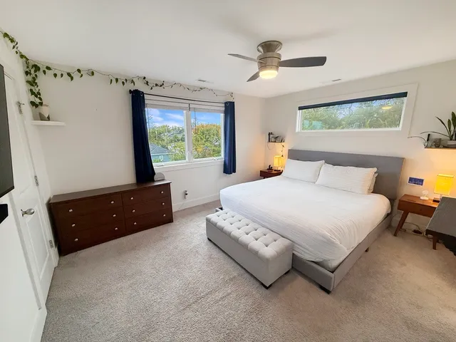 a view of an apartment with a garden