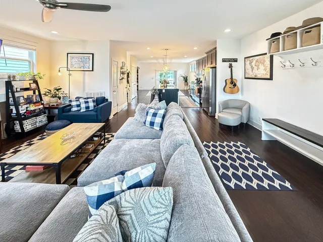 a living room with furniture and a couch