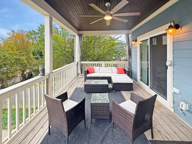 a outdoor living space with furniture and garden view