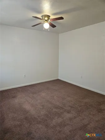 a view of room with fan