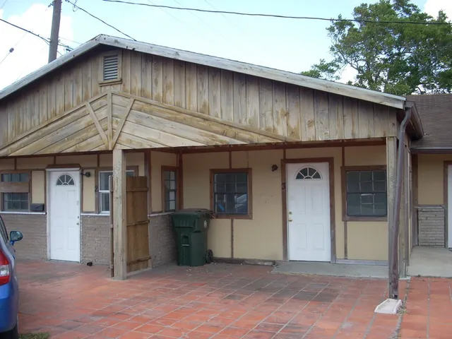 a front view of a house with a porch