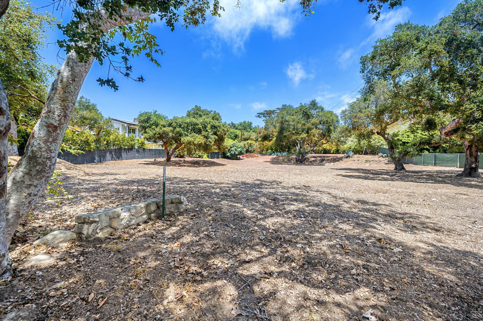 361 Hot Springs Road Montecito, CA 93108 - Photo 3 of 5 a backyard of a house with lots of green space