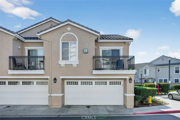 a front view of a building with large windows