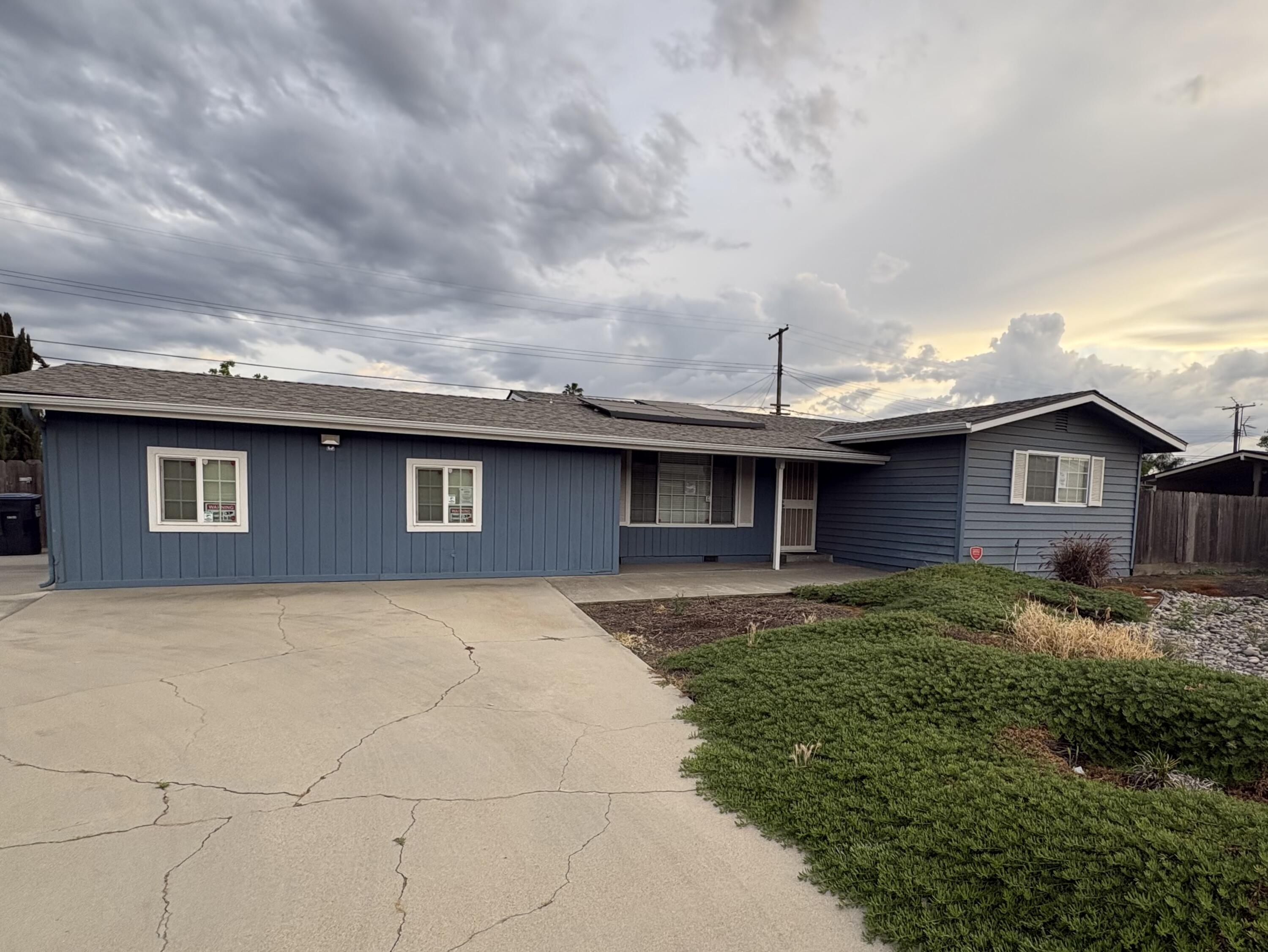 1109 West Riggin Avenue Visalia, CA 93291 - Photo 1 of 15 Front of Home