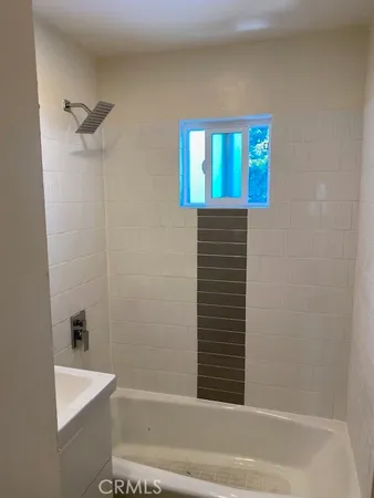 a bathroom with a bathtub