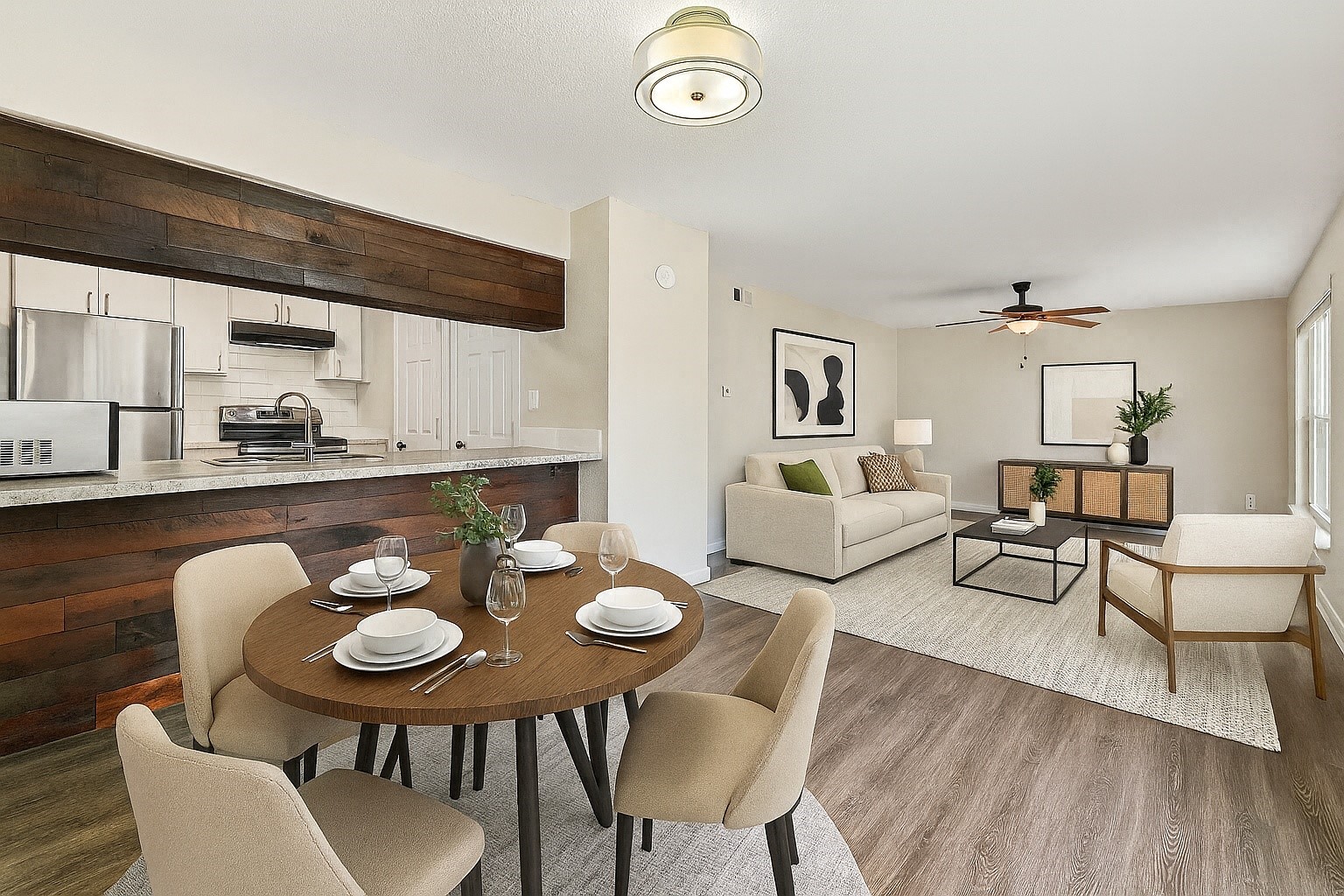5005 Manor Road, Unit 132 Austin, TX 78723 - Photo 6 of 28 a view of a dining room with furniture and wooden floor