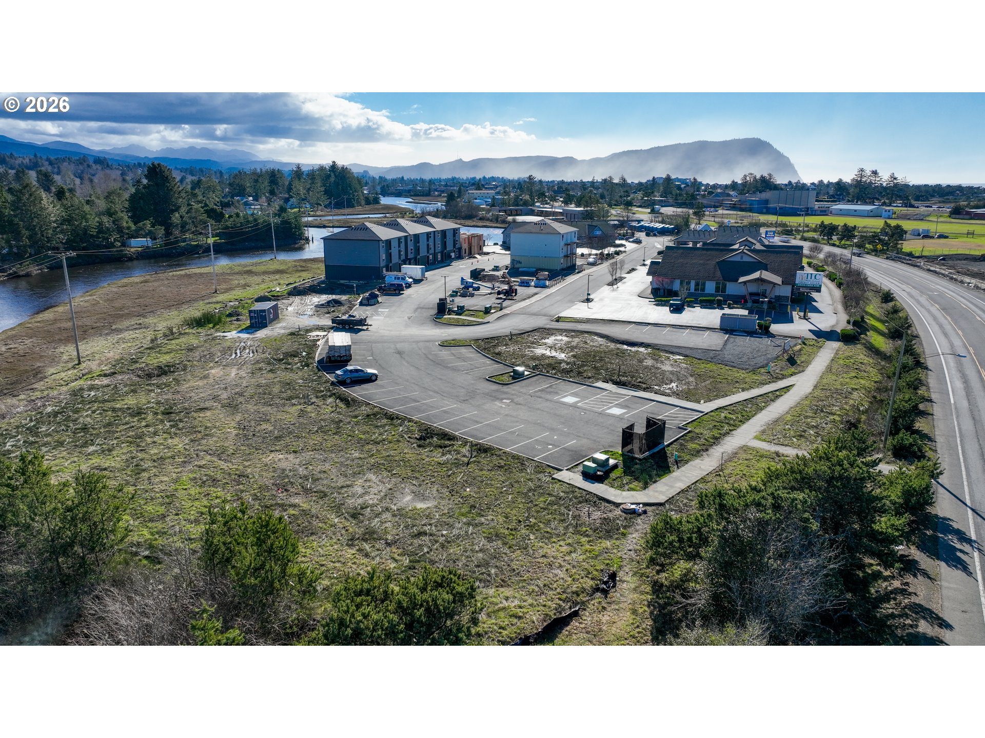 Cross Creek Street, Unit 12 Seaside, OR 97138 - Photo 14 of 18 a view of a lake in middle of the town