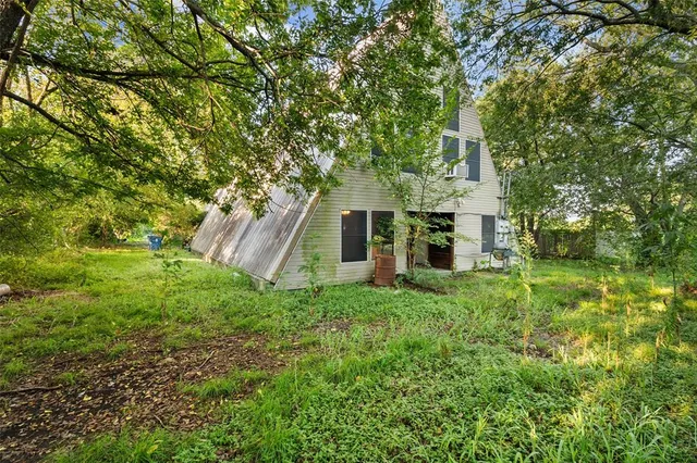 a view of a field with an ocean