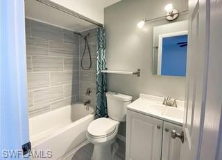 152 Lake Point Lane, Unit 4A Naples, FL 34112 - Photo 12 of 15 a bathroom with a sink toilet and shower
