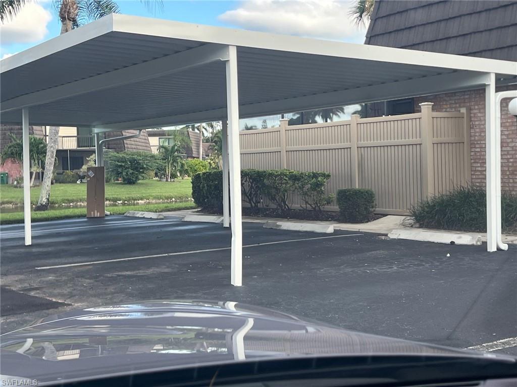 152 Lake Point Lane, Unit 4A Naples, FL 34112 - Photo 15 of 15 a view of a backyard