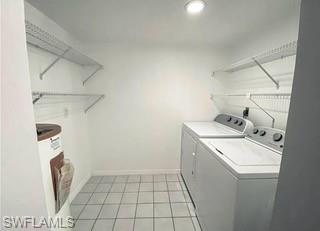 152 Lake Point Lane, Unit 4A Naples, FL 34112 - Photo 6 of 15 a utility room with dryer and washer