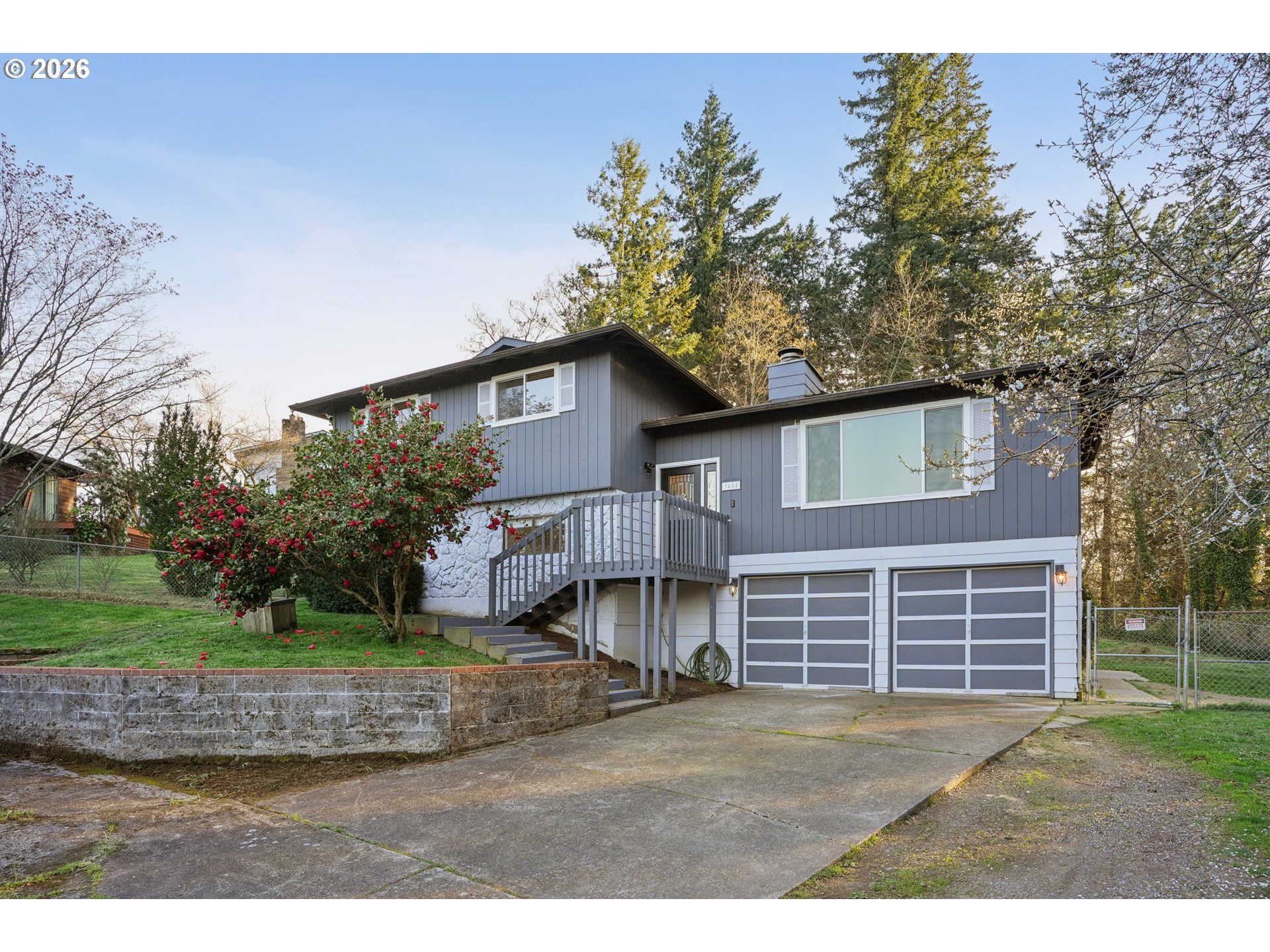 3454 Northeast 5th Court Gresham, OR 97030 - Photo 2 of 34 a view of an house with backyard space and garden