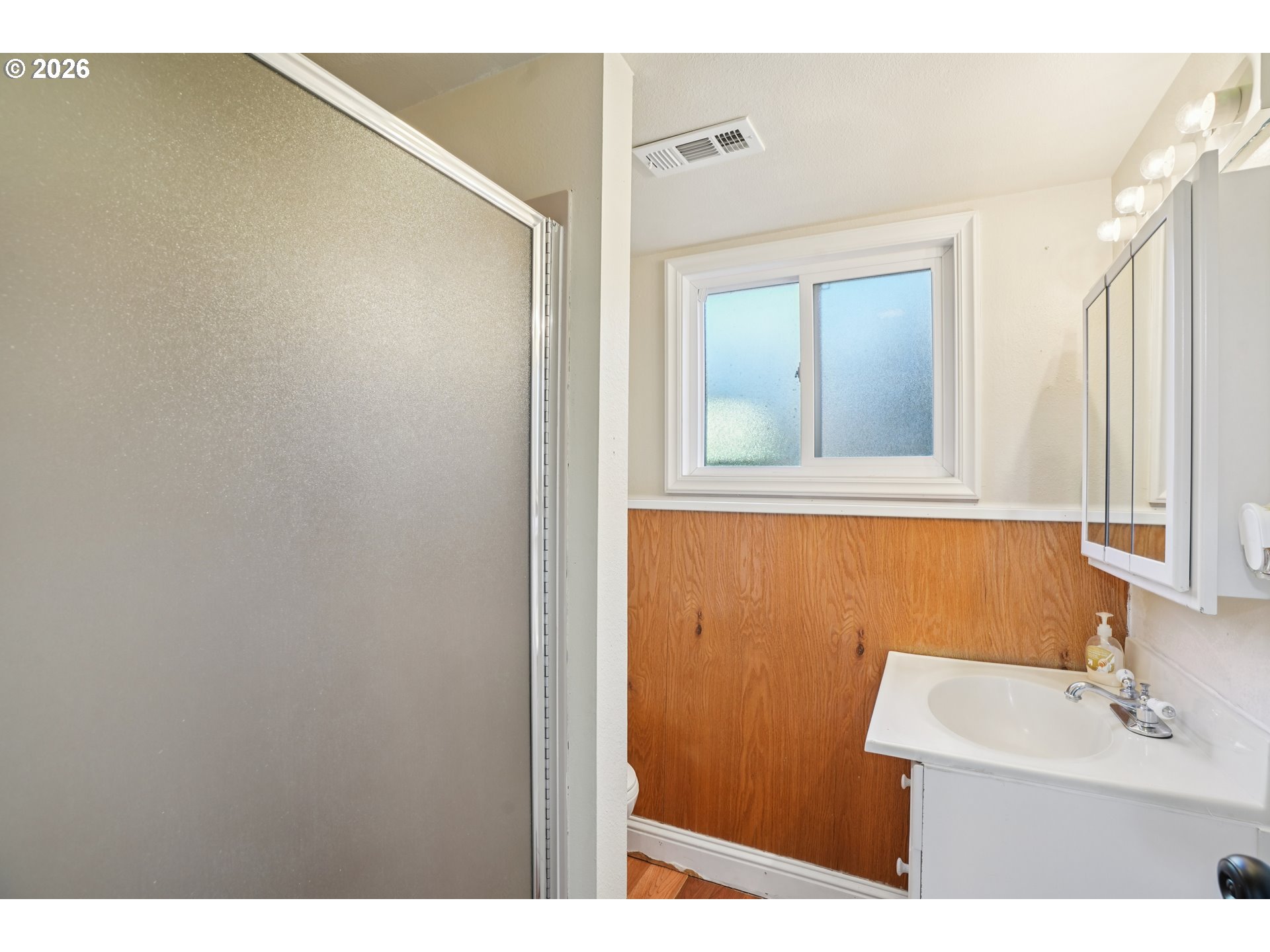 3454 Northeast 5th Court Gresham, OR 97030 - Photo 26 of 34 a bathroom with a sink and a mirror