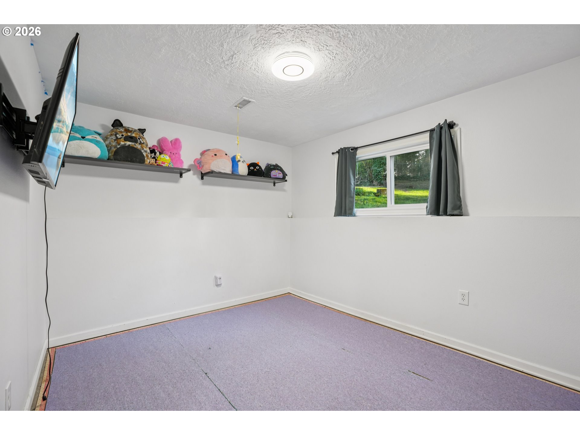 3454 Northeast 5th Court Gresham, OR 97030 - Photo 27 of 34 a view of a storage & utility room with a window