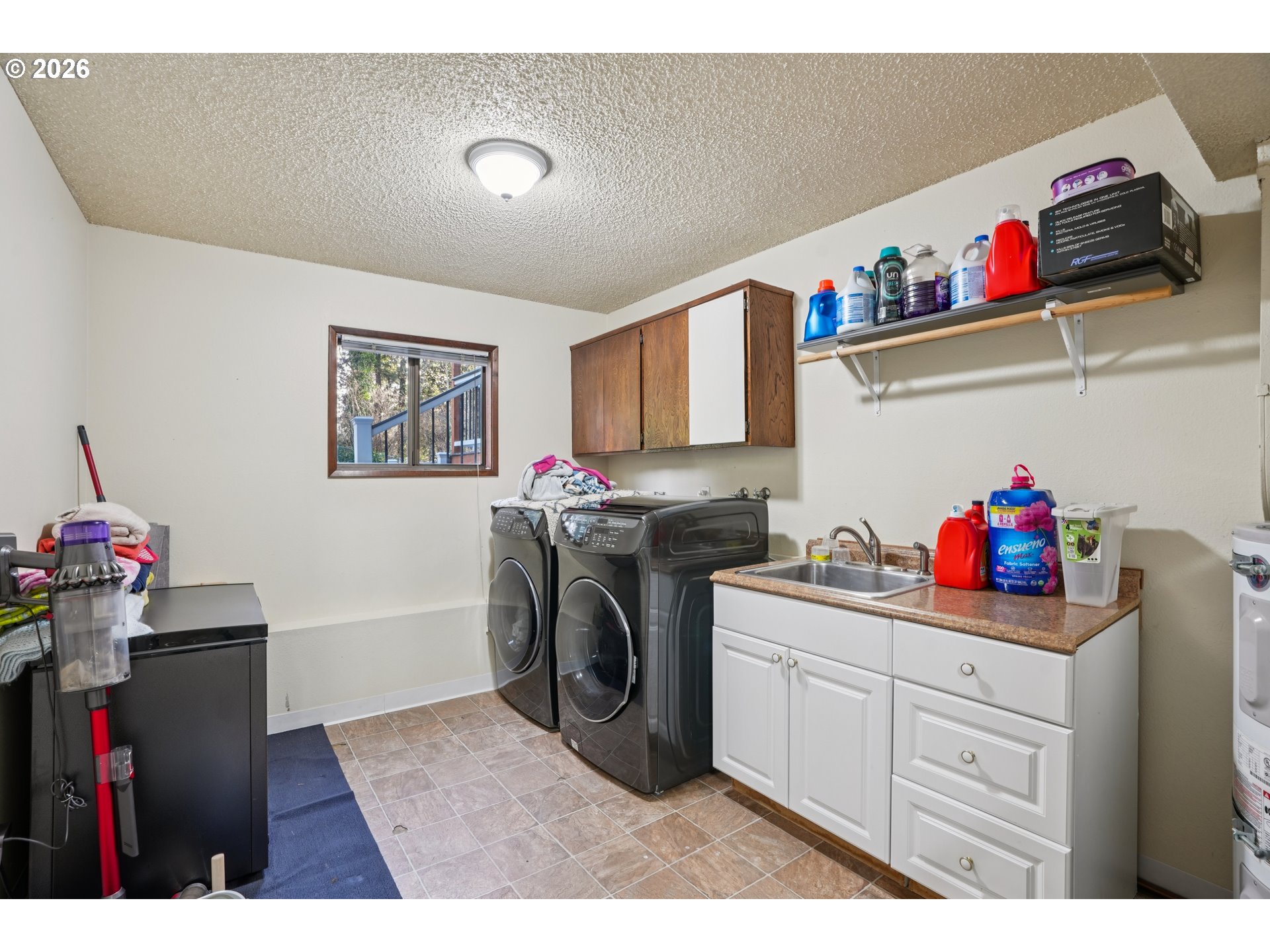 3454 Northeast 5th Court Gresham, OR 97030 - Photo 29 of 34 a utility room with sink dryer and washer