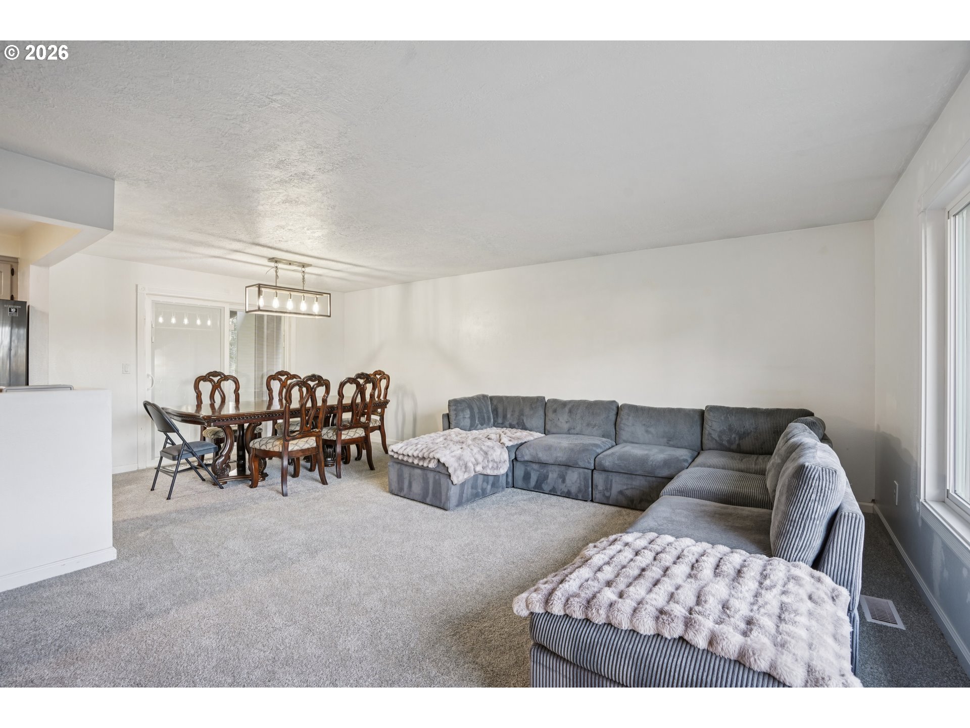 3454 Northeast 5th Court Gresham, OR 97030 - Photo 7 of 34 a living room with furniture and white walls