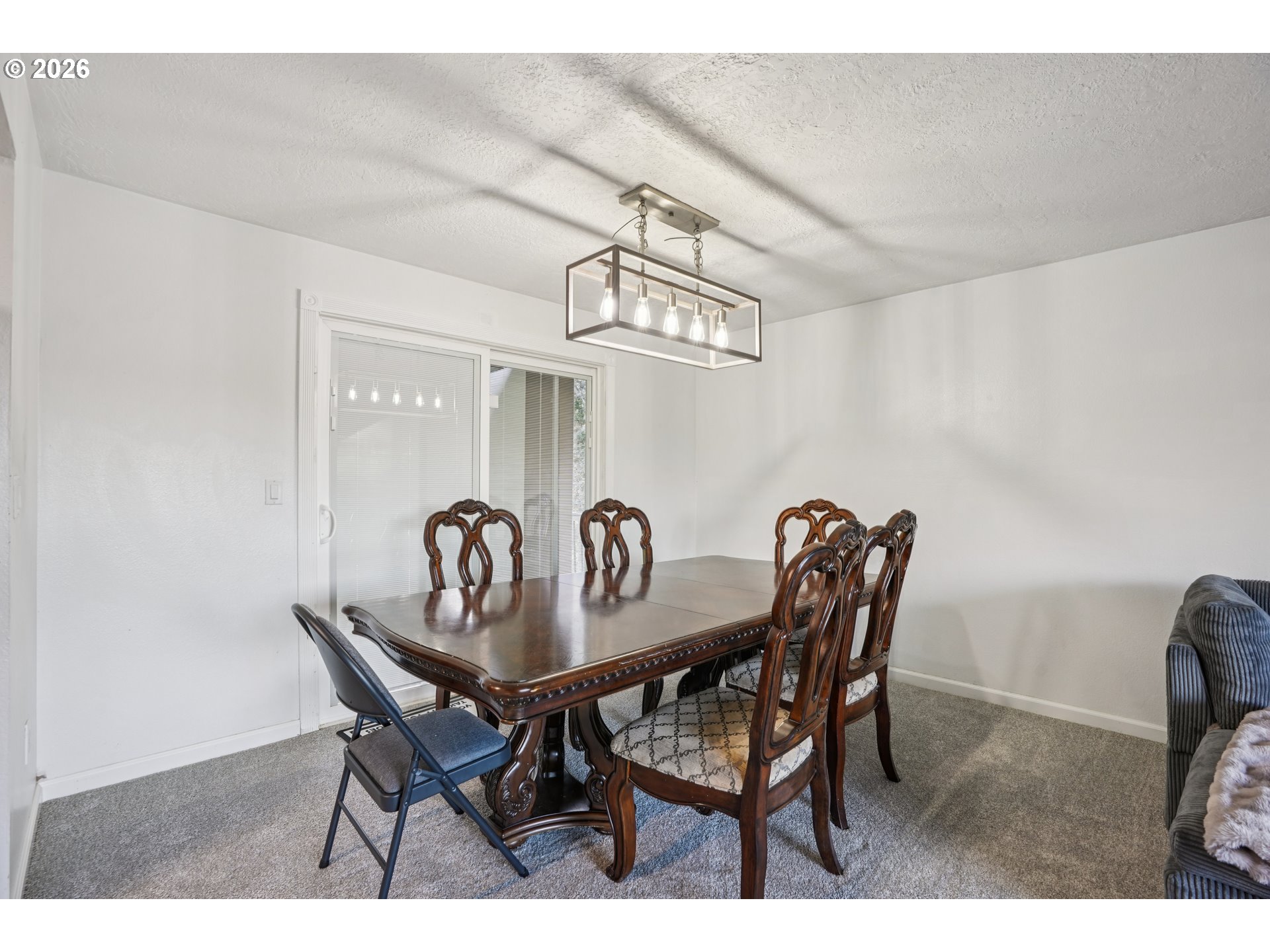 3454 Northeast 5th Court Gresham, OR 97030 - Photo 9 of 34 a dining room with furniture and chandelier
