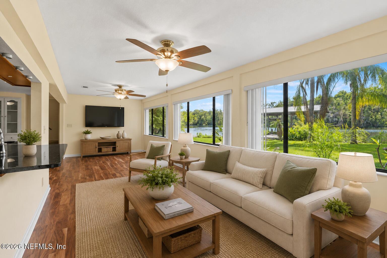 145 Finnigan Road Satsuma, FL 32189 - Photo 7 of 43 a living room with furniture and a large window