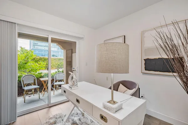 a living room with furniture and a window