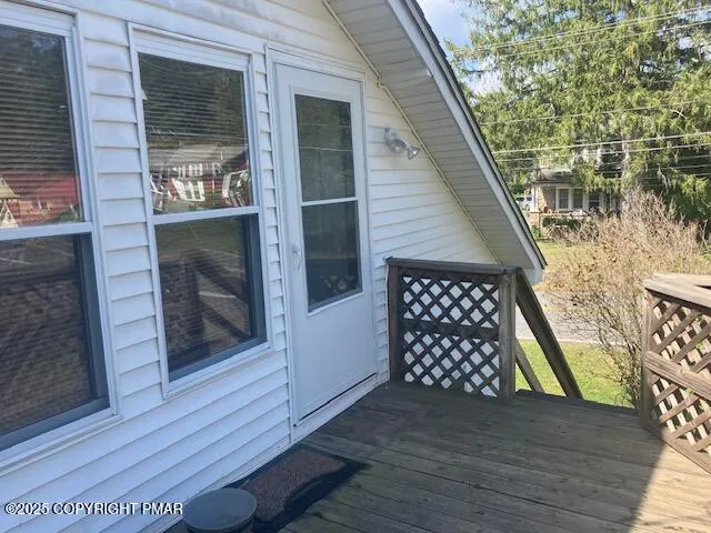 a view of a balcony with a sink