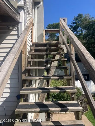 a view of buildings with yard