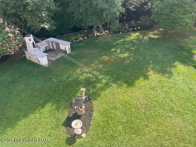 a view of a garden with an outdoor space