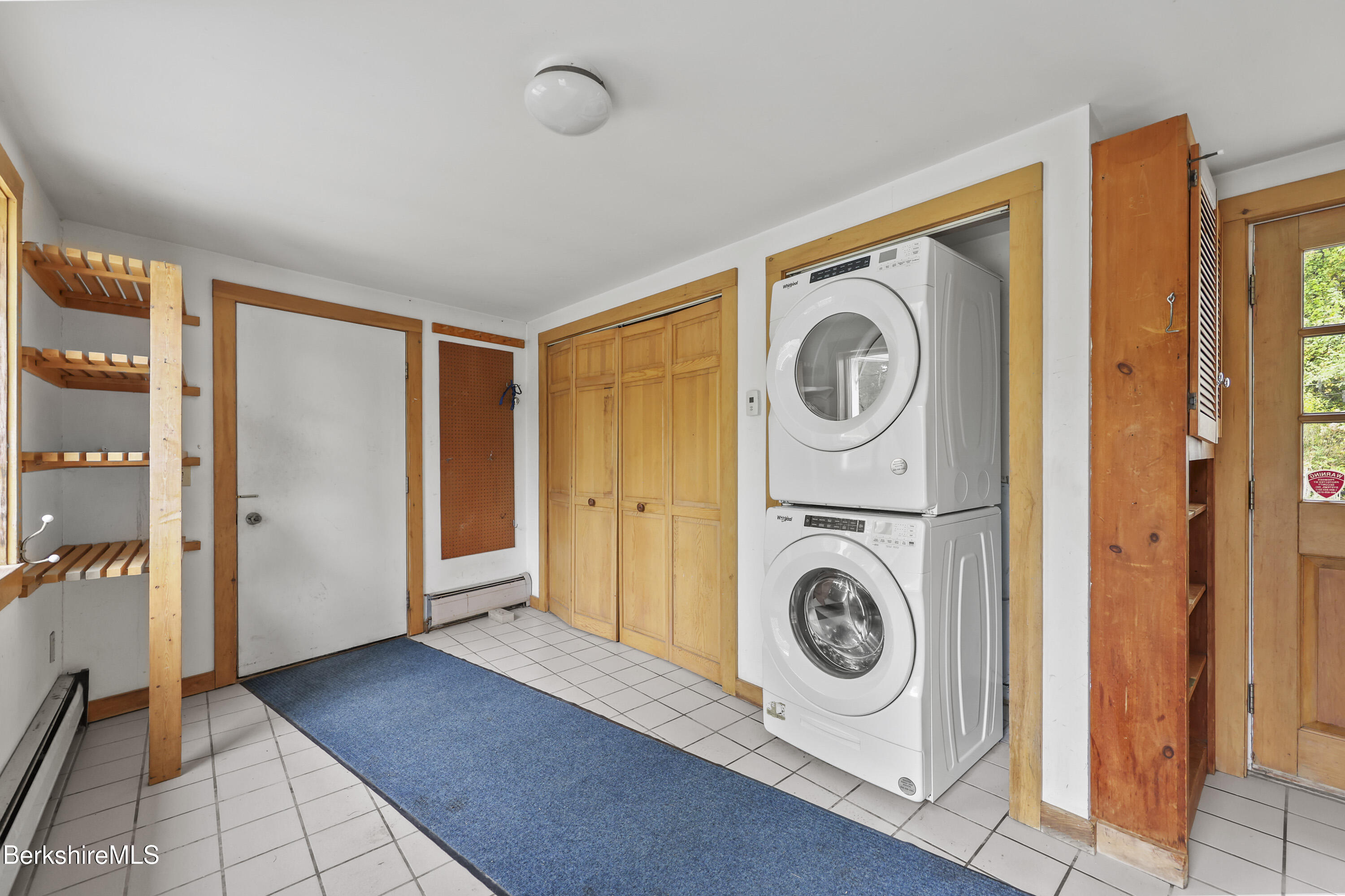 1030 Simonds Road Williamstown, MA 01267 - Photo 55 of 76 a view of a storage & utility room with washer and dryer