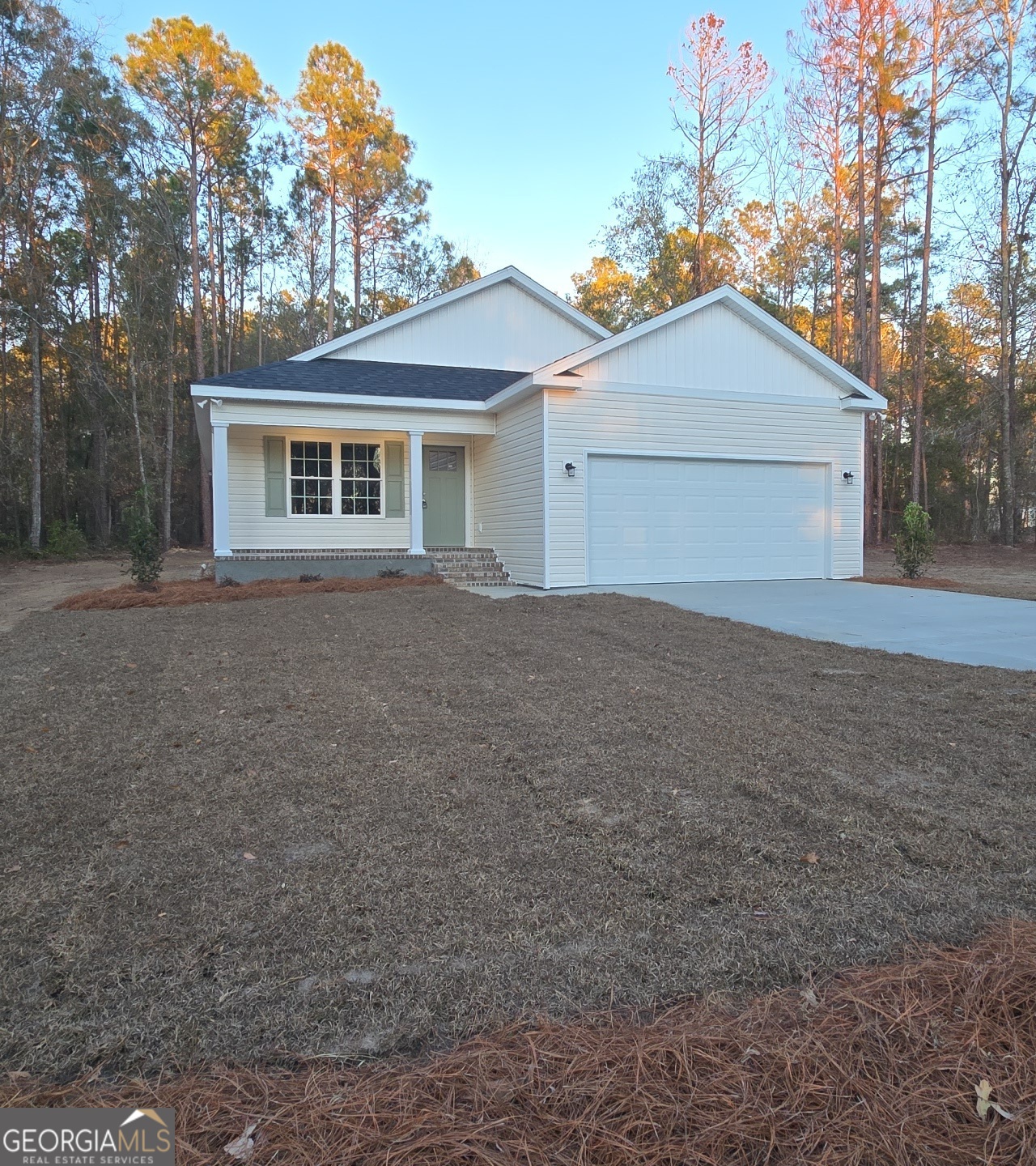26466 Turner Road Metter, GA 30439 - Photo 1 of 39 a view of a house with a yard