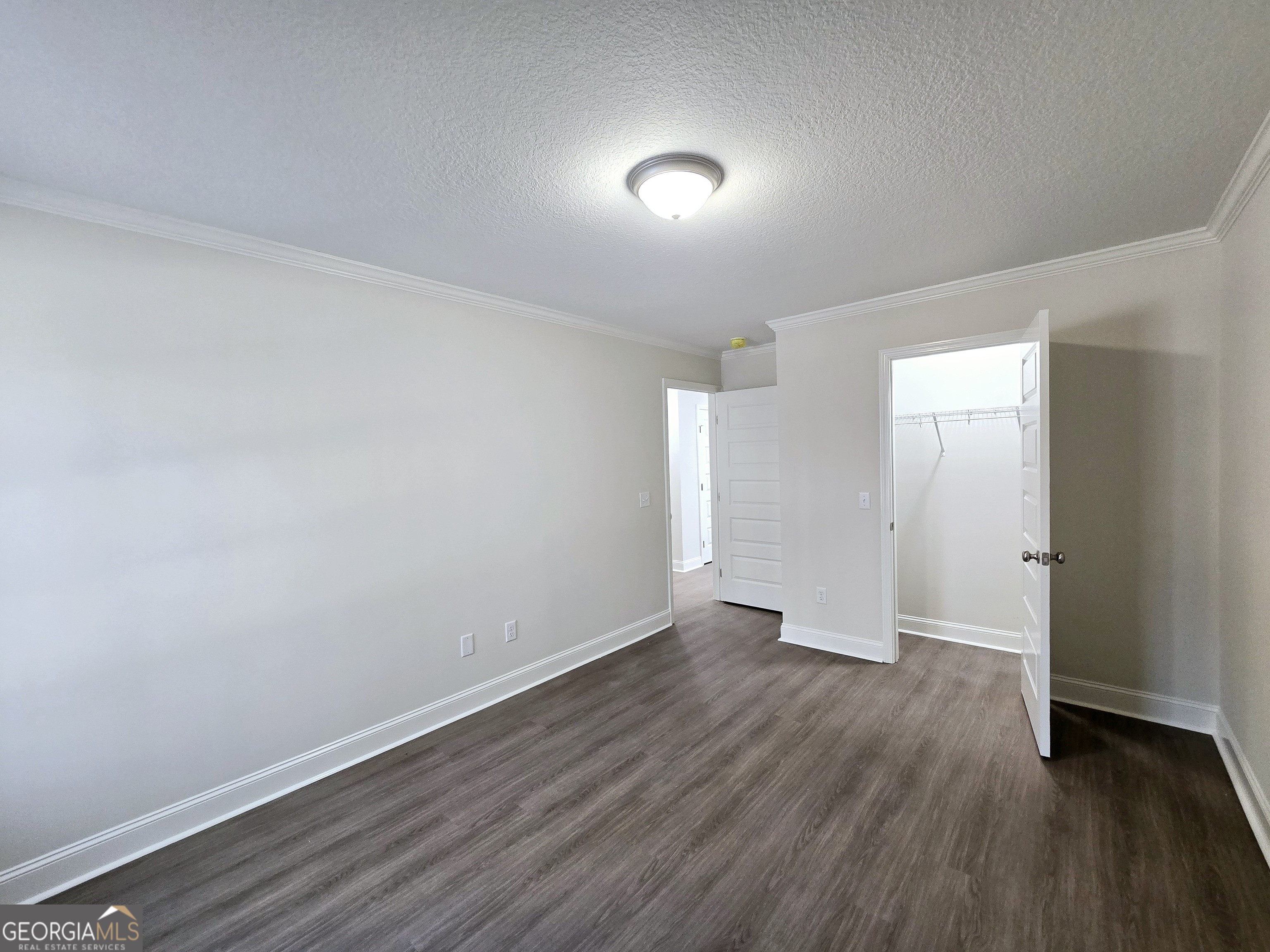 26466 Turner Road Metter, GA 30439 - Photo 24 of 39 a view of an empty room with wooden floor