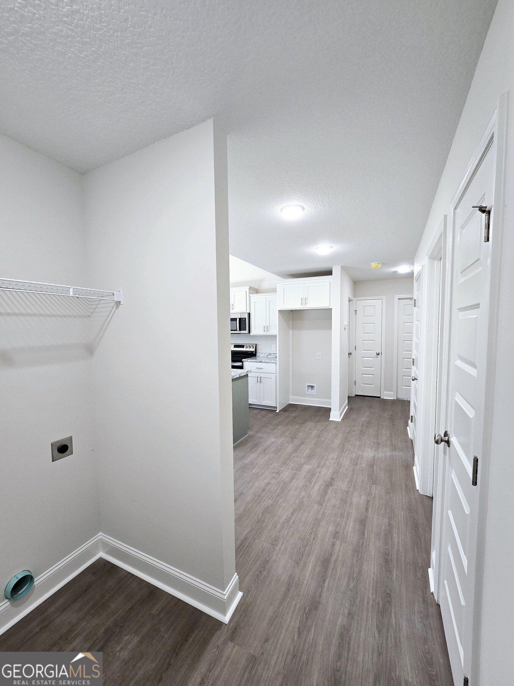 26466 Turner Road Metter, GA 30439 - Photo 33 of 39 a view of empty room with wooden floor and window