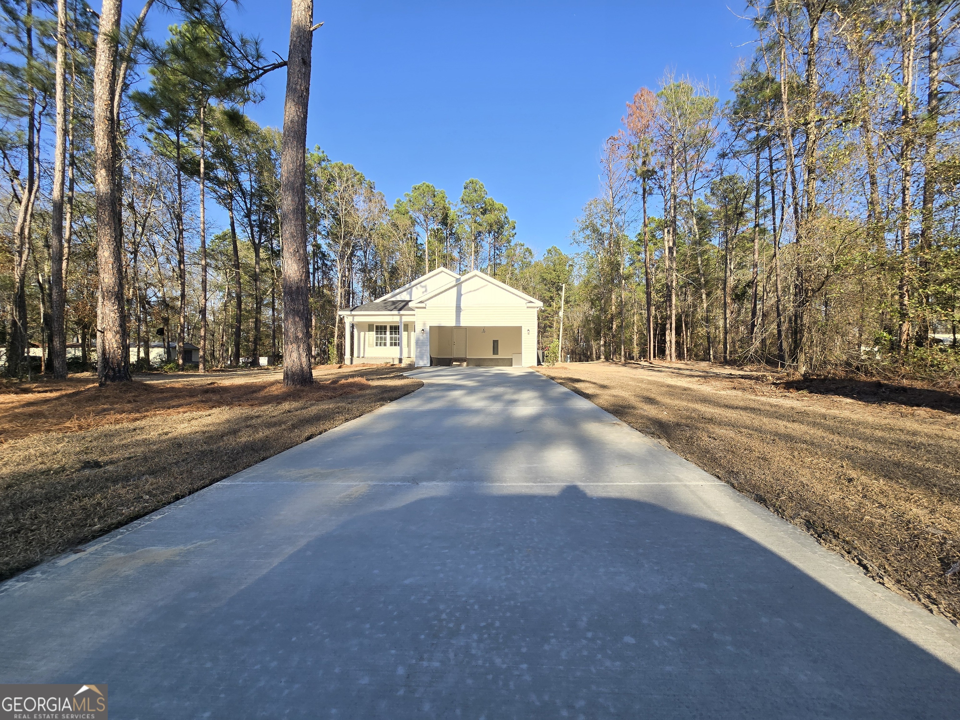 26466 Turner Road Metter, GA 30439 - Photo 39 of 39 a front view of a house with a yard and trees