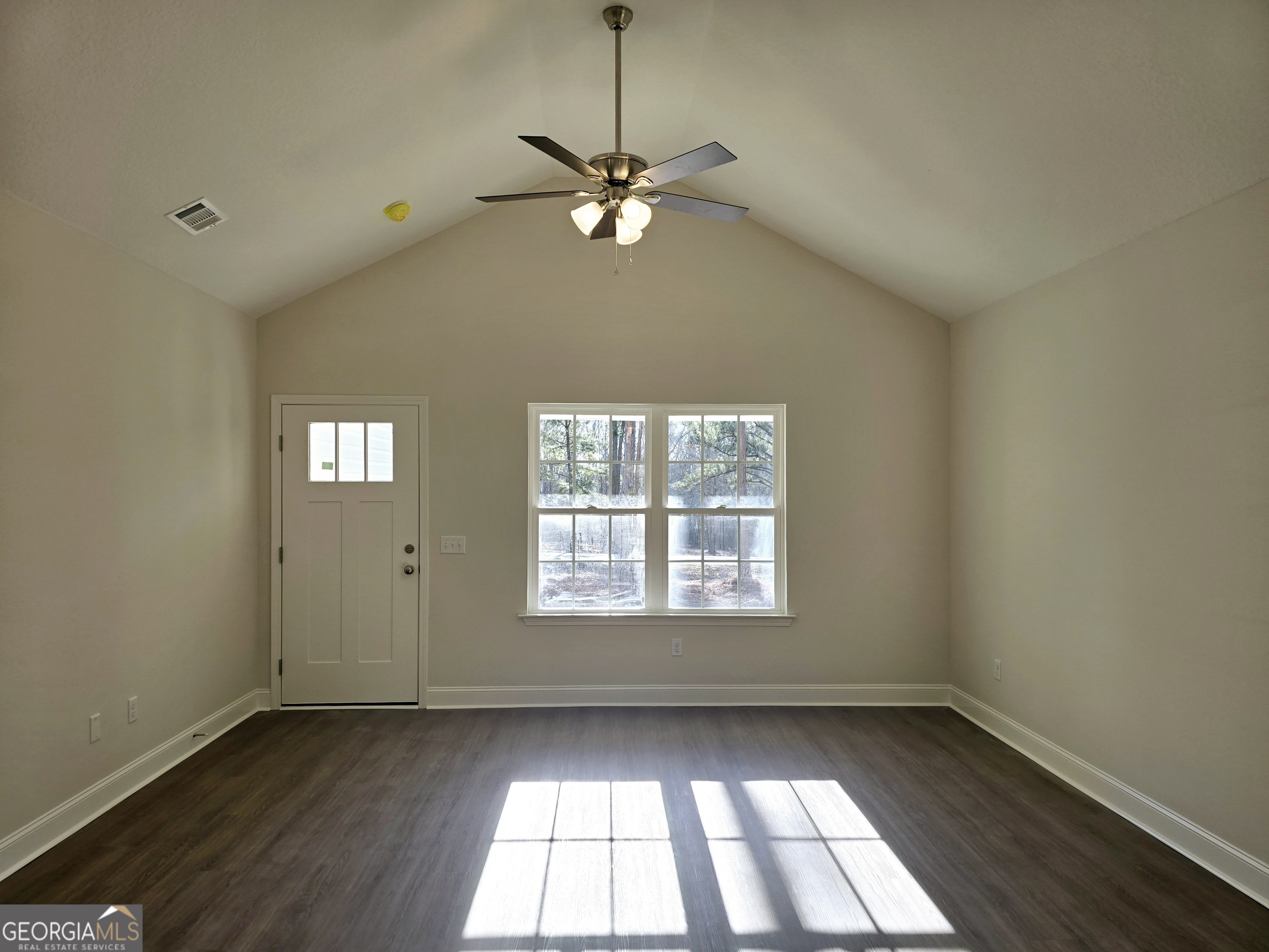 26466 Turner Road Metter, GA 30439 - Photo 5 of 39 a view of a livingroom with a window