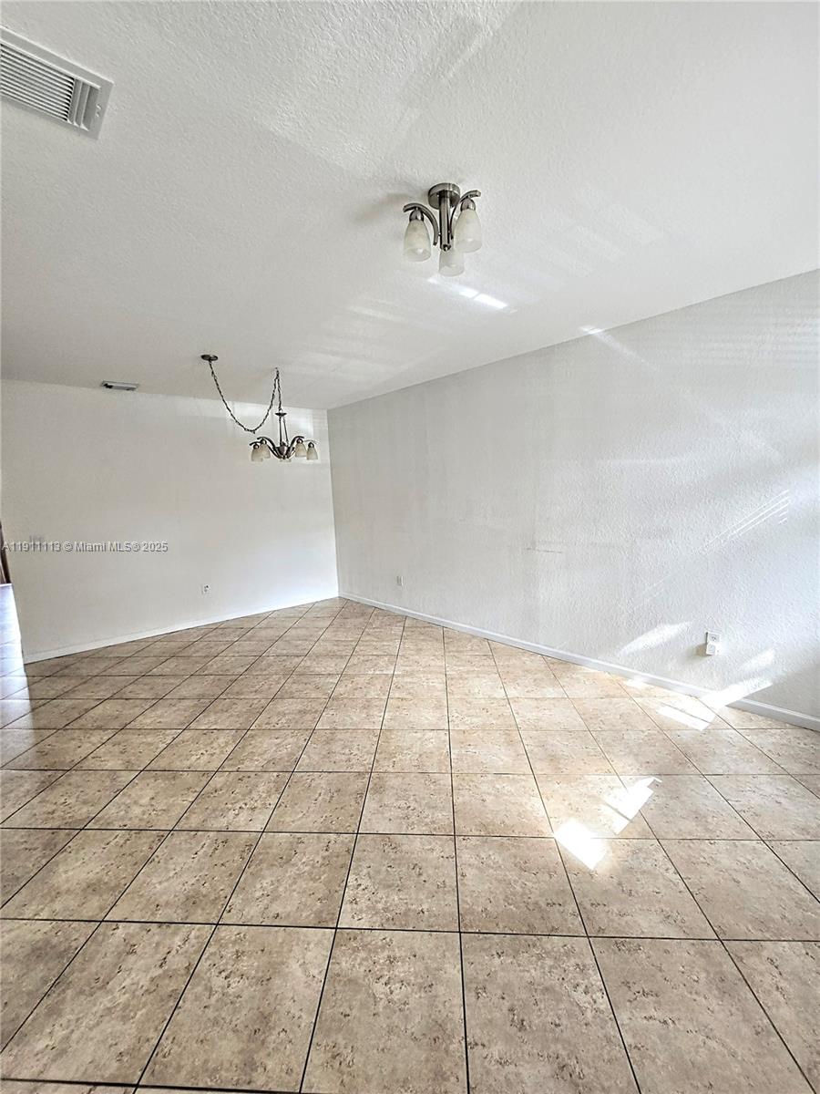 988 Southwest 154th Path Miami, FL 33194 - Photo 14 of 31 a view of an empty room